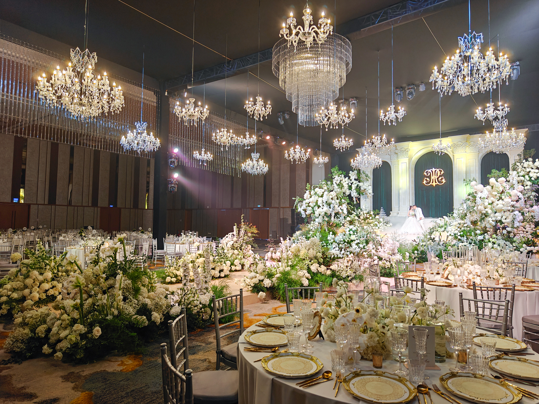 Get lost in a fairy tale dream amidst a poetic wedding space filled with flowers at Ariyana Convention Centre Danang